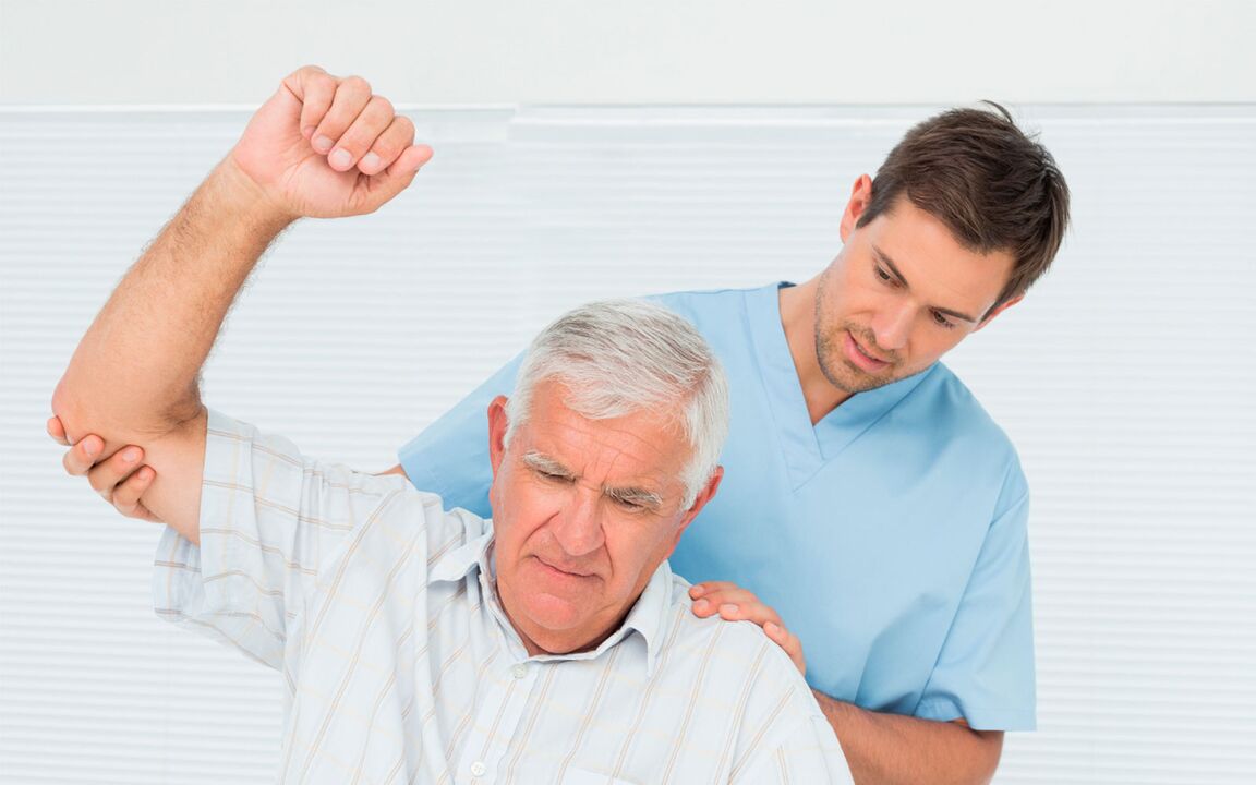 doctor examining patient with shoulder osteoarthritis